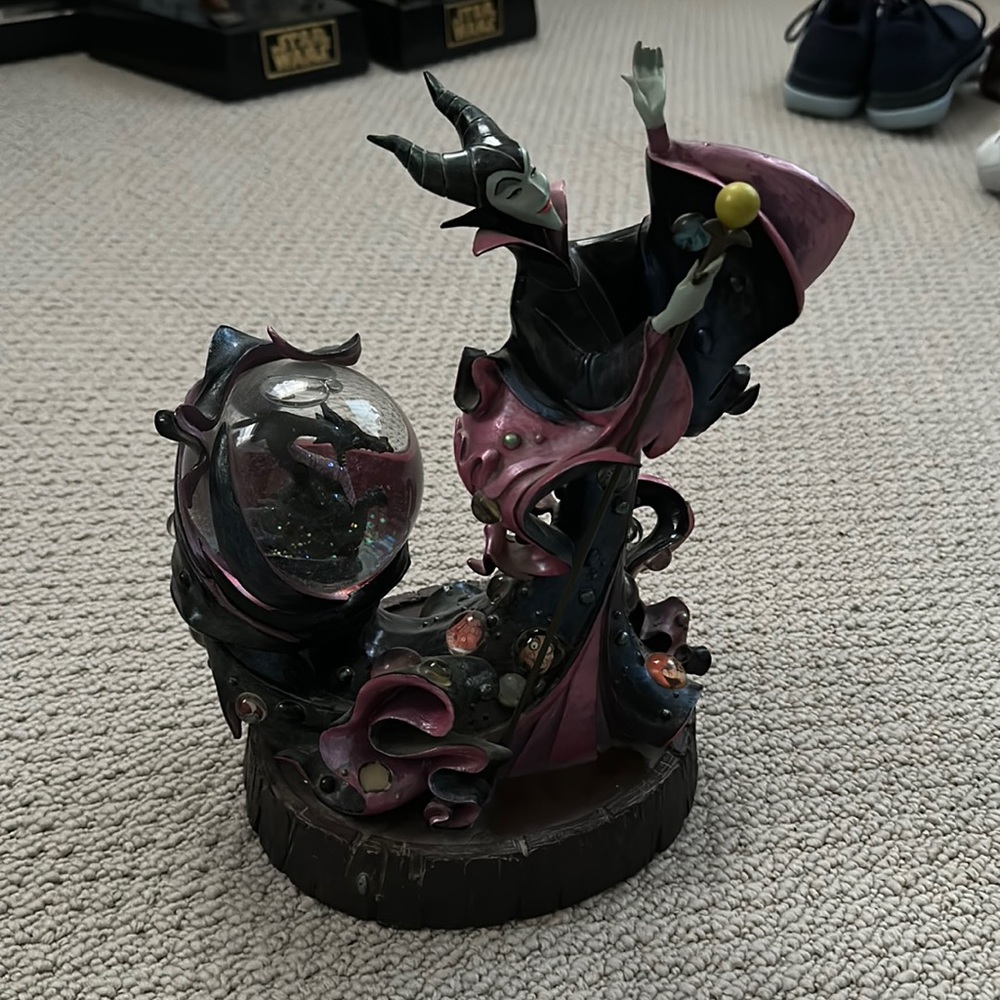 Disney Malificent snow globe in great condition.